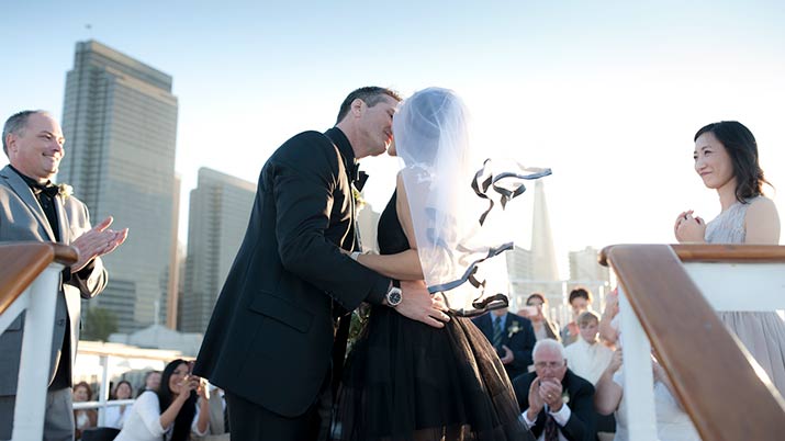 flora and robert wedding kiss