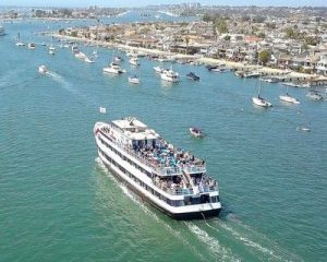 newport harbor boat and coastline