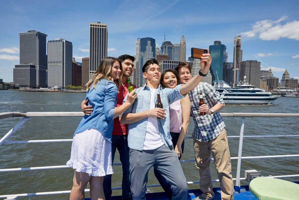 New York backdrop with friends taking a selfie