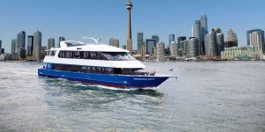 Hornblower Esprit on water with CN Tower in background.