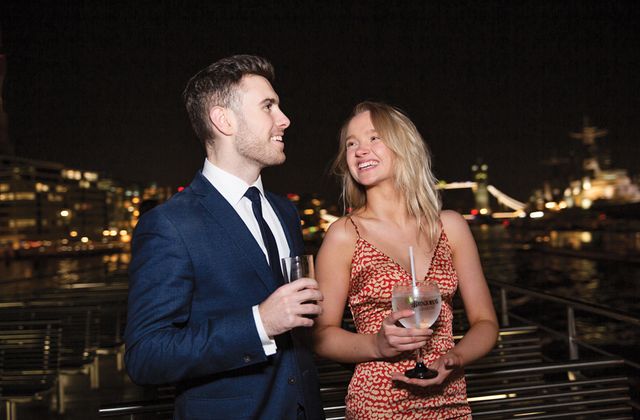 couple laughing on a boat - new years gala
