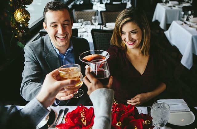 Christmas couple cheering