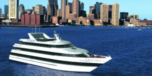 Boston Odyssey ship with Boston in background