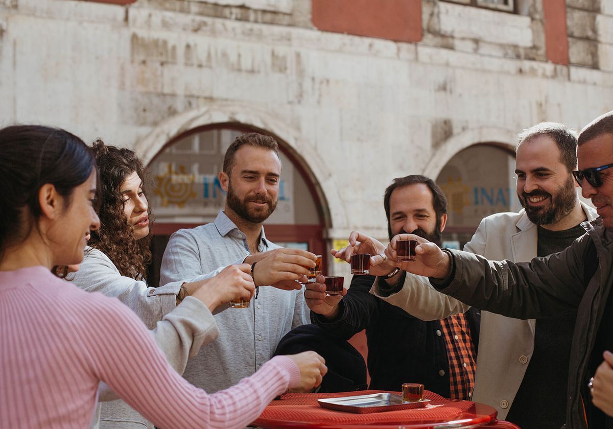 People cheering wine