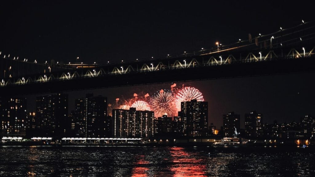 New York City Fireworks bridge in background.