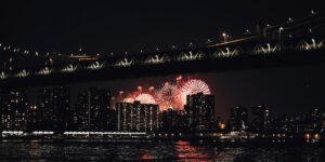 New York City Fireworks bridge in background.