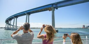 People taking pictures of the San Diego Coronado Bridge