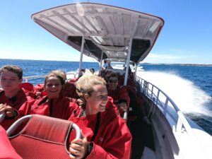 People on a speed boat