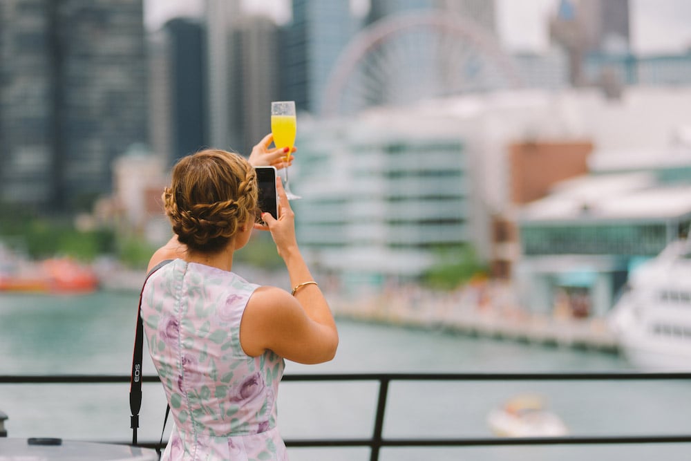 Selfie of a mimosa with water and Chicago in background