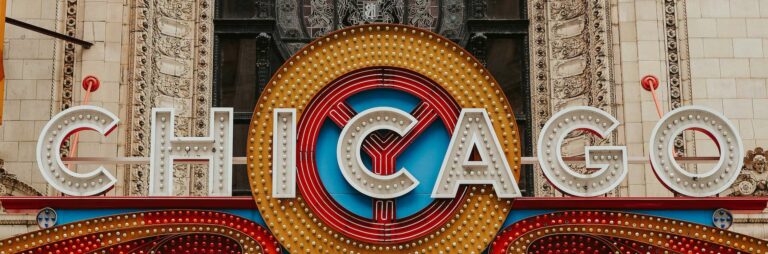 Fun Places To Eat In Chicago In 2024   Chicago Theatre Sign 768x254 