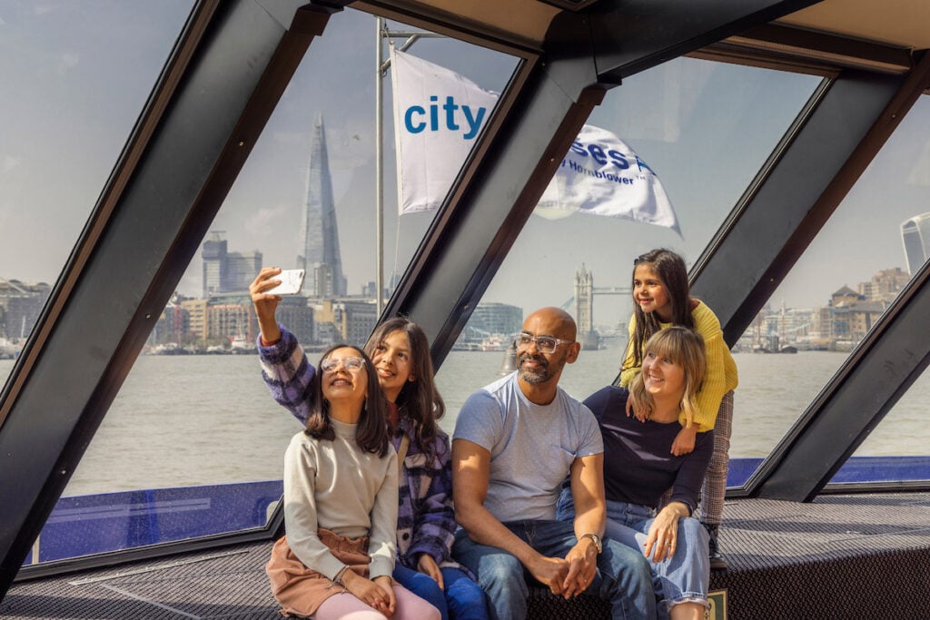 Family inside a boat taking a selfie
