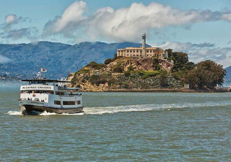 cruise ship sailing by alcatraz