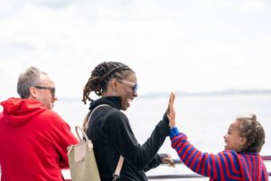 Mother and daughter giving a high five