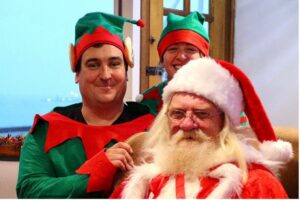 Santa with his elves