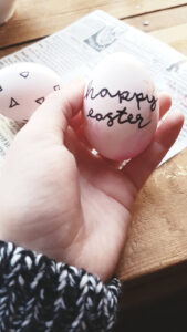 child holding easter egg