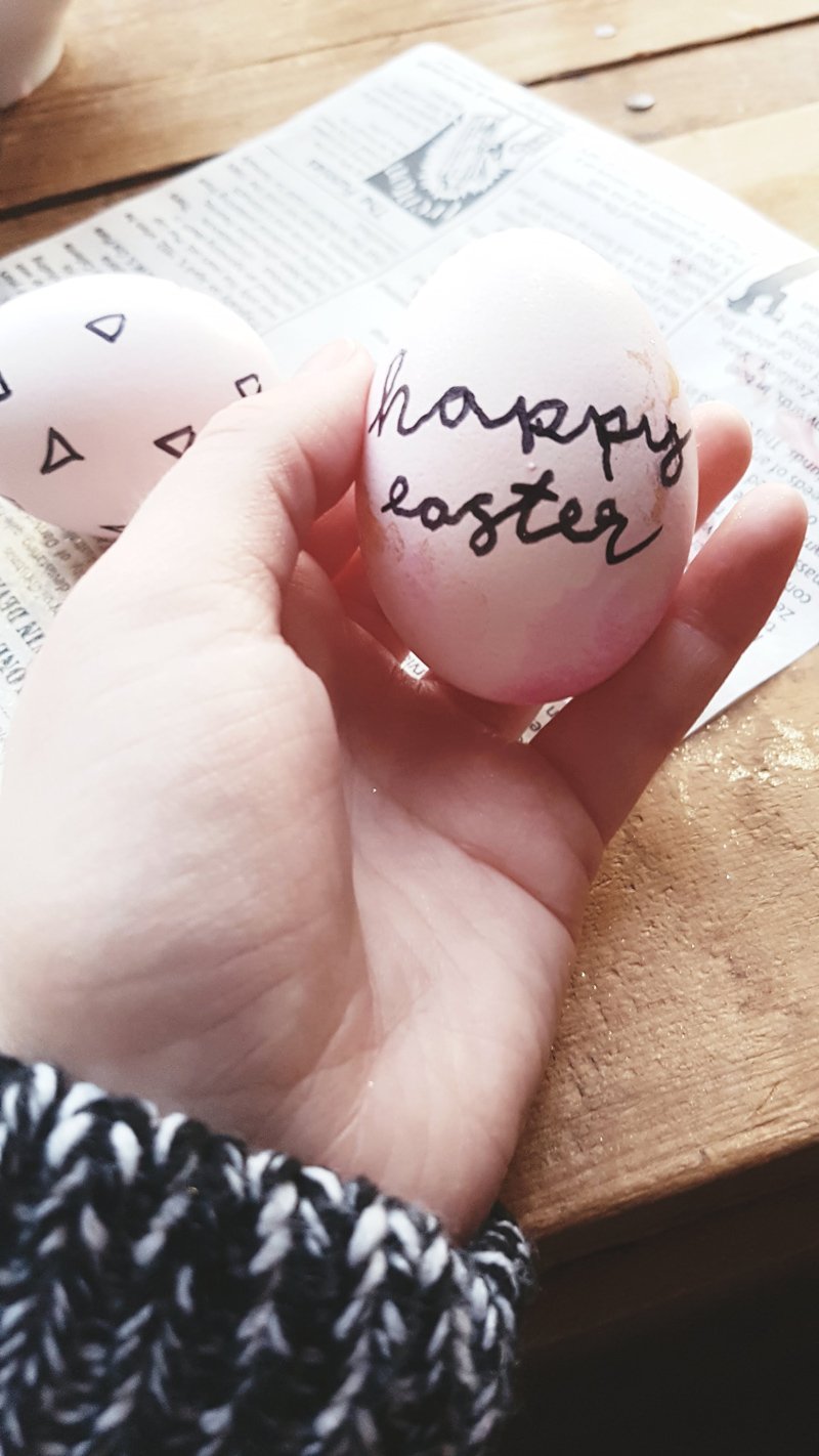 child holding easter egg