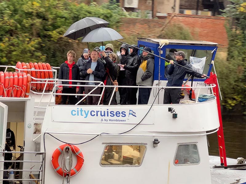 filming crew on city cruise in york