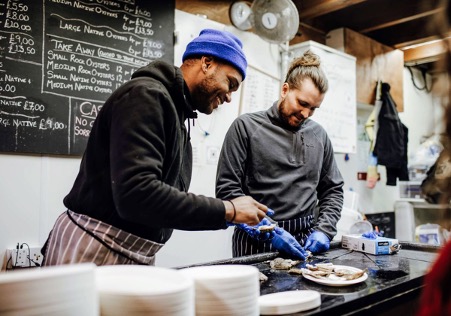 men food prepping at borough market