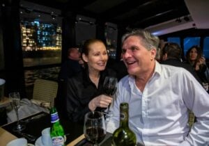 couple enjoying a dinner cruise on thames rives