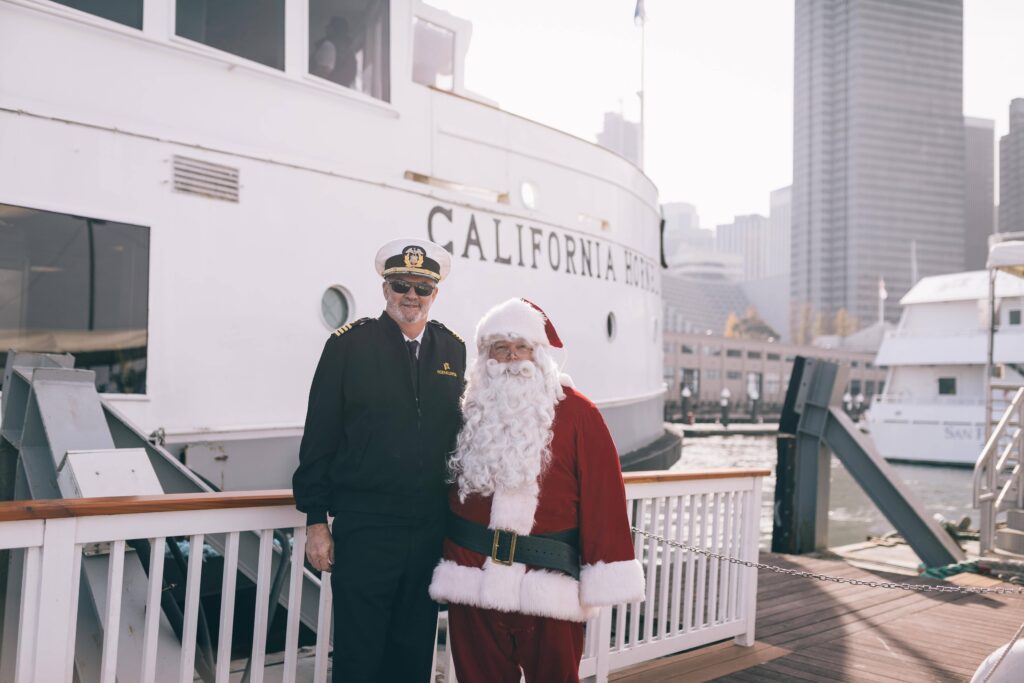 Santa with the Captain of the California Hornblower vessel in San Francisco