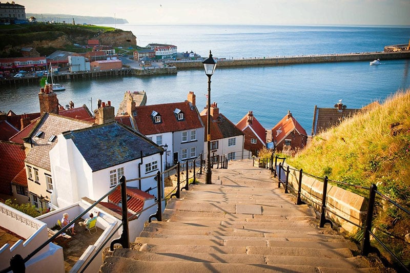 houses in whitby overlooking the coast