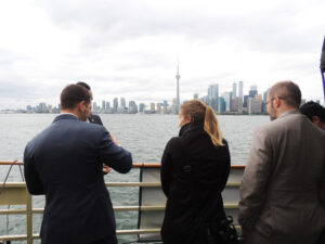group looking over boat deck on a boat in toronto 