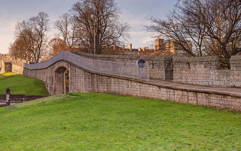 york wall and castle in background