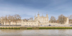 view of the tower of london from thames river
