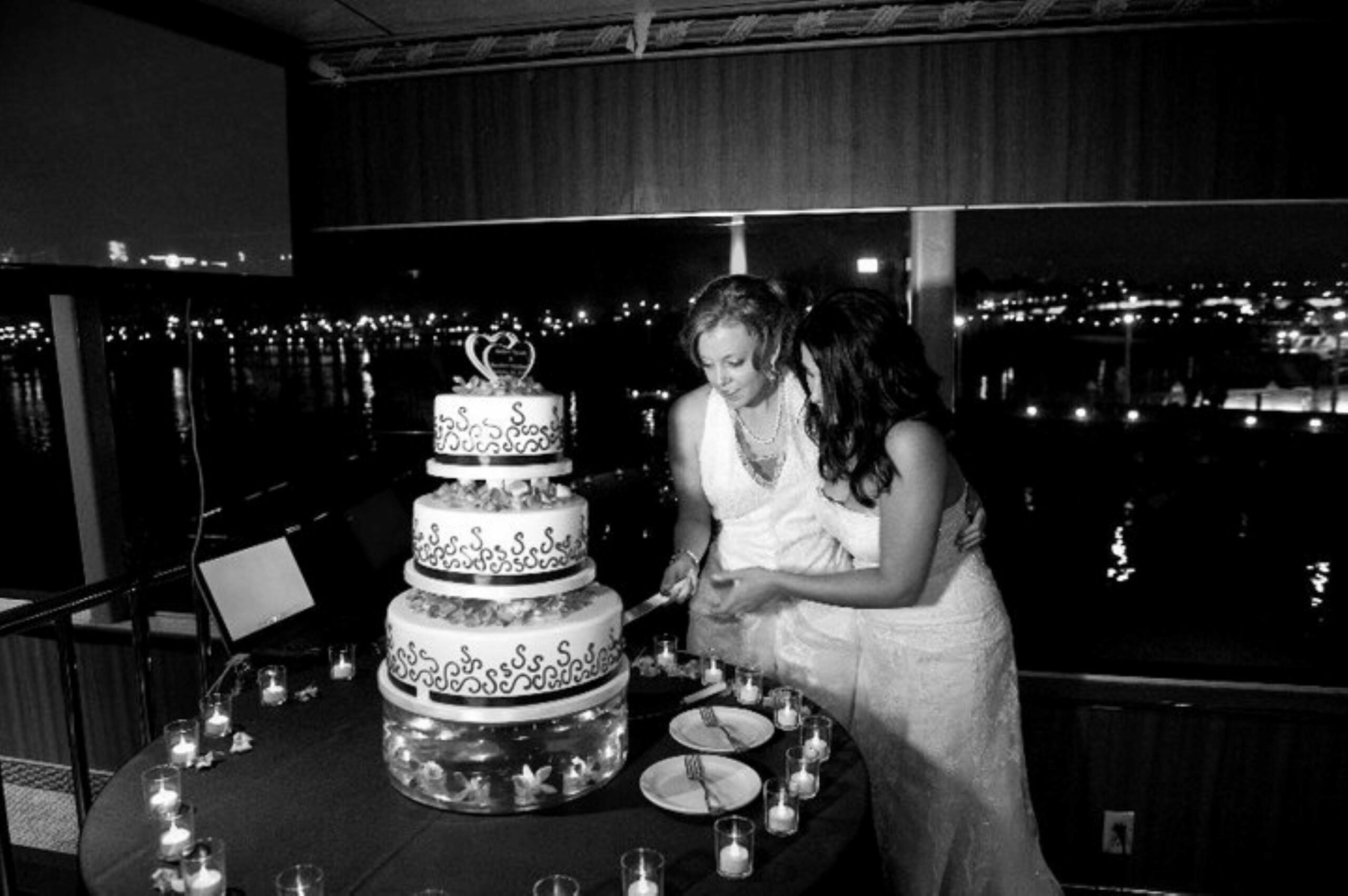 crew member amber cross cutting cake wedding