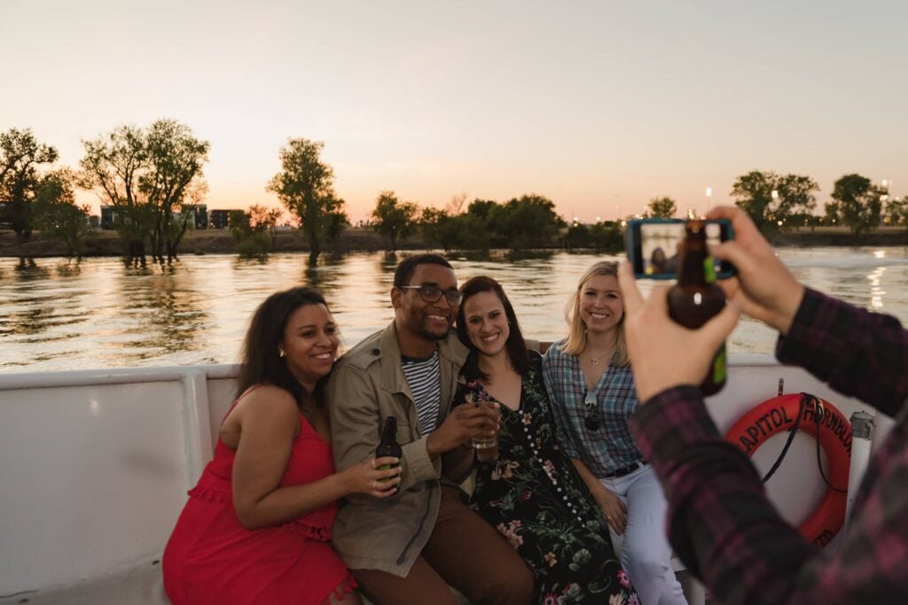 Group of friends having a great time on City Cruises Sacramento