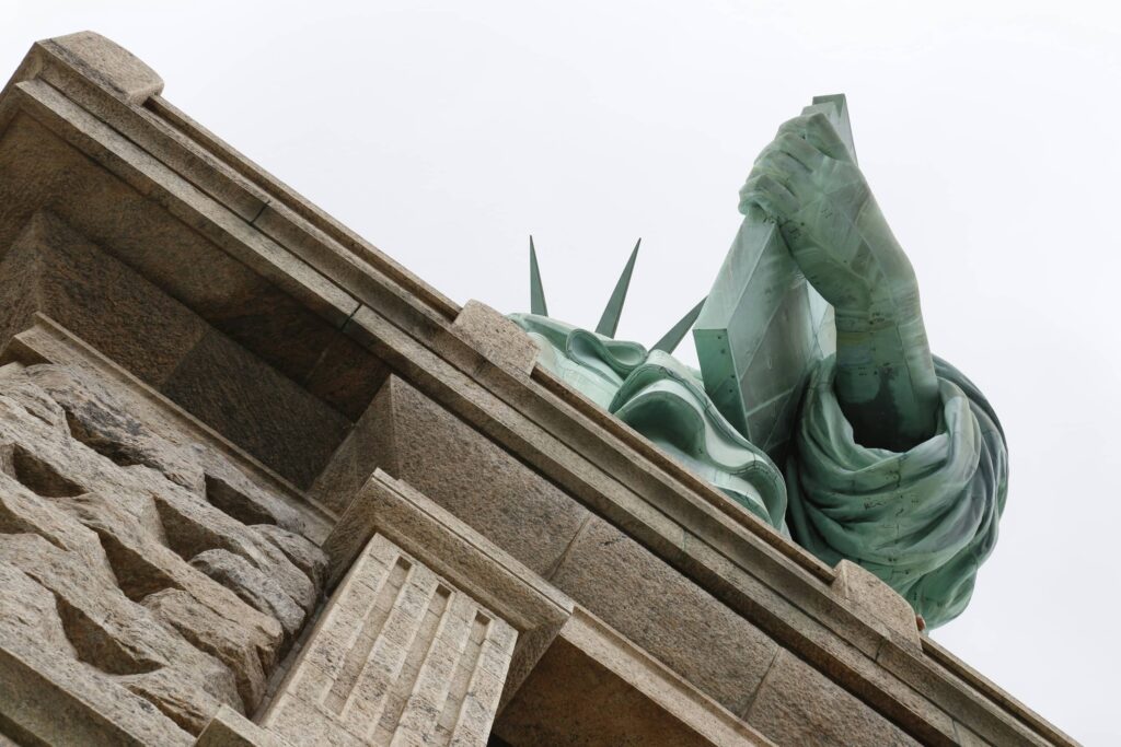 low angle photo of Statue of Liberty
