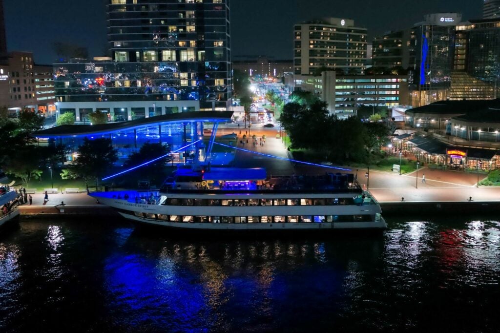 baltimore at night with boat and skyline