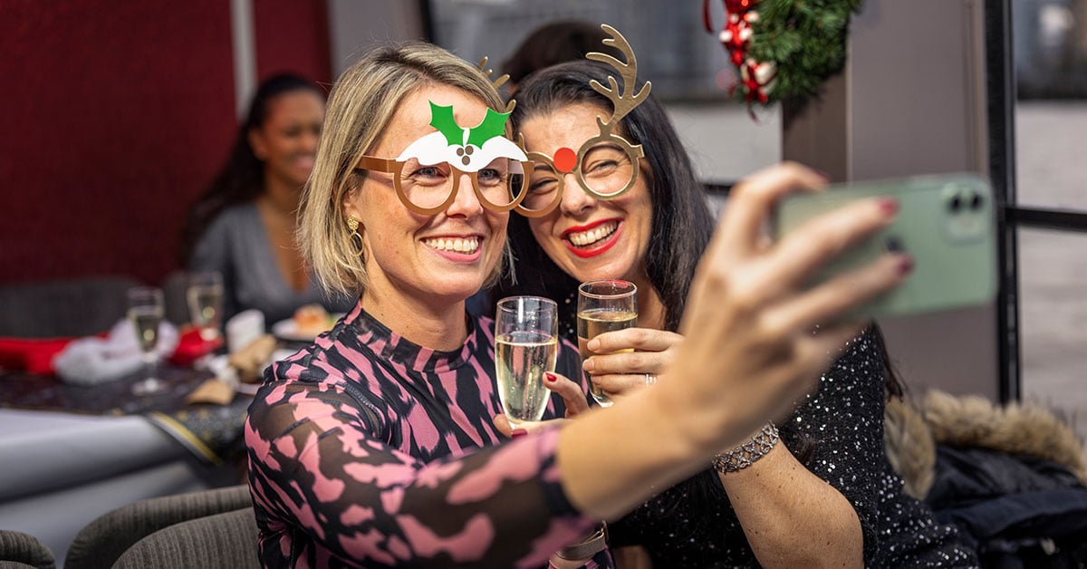 Friends on a City Cruises vessel during Christmas