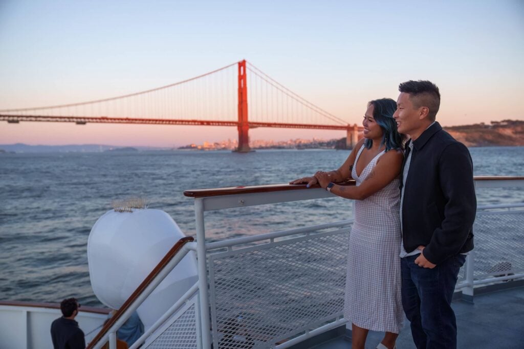 Couple celebrating in San Francisco on a City Cruises vessel