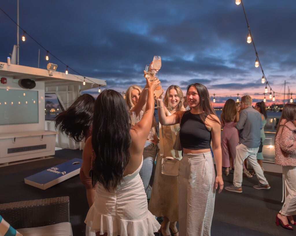 Group celebrating a birthday party onboard City Cruises in Los Angeles