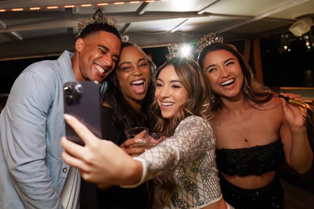 Group celebrating New Year's Eve on a City Cruises vessel