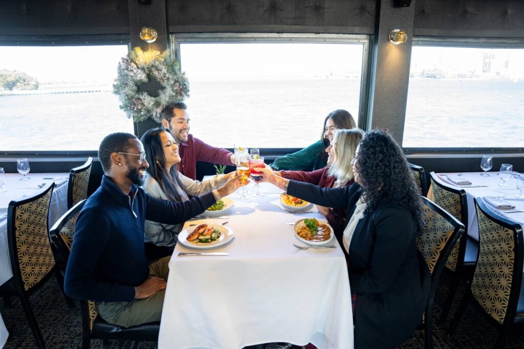 Group enjoying a holiday party on a City Cruises vessel