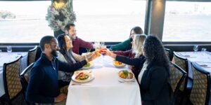 Group enjoying a holiday party on a City Cruises vessel