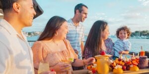 Group enjoying eating on the Los Angeles waterfront on City Cruises vessel