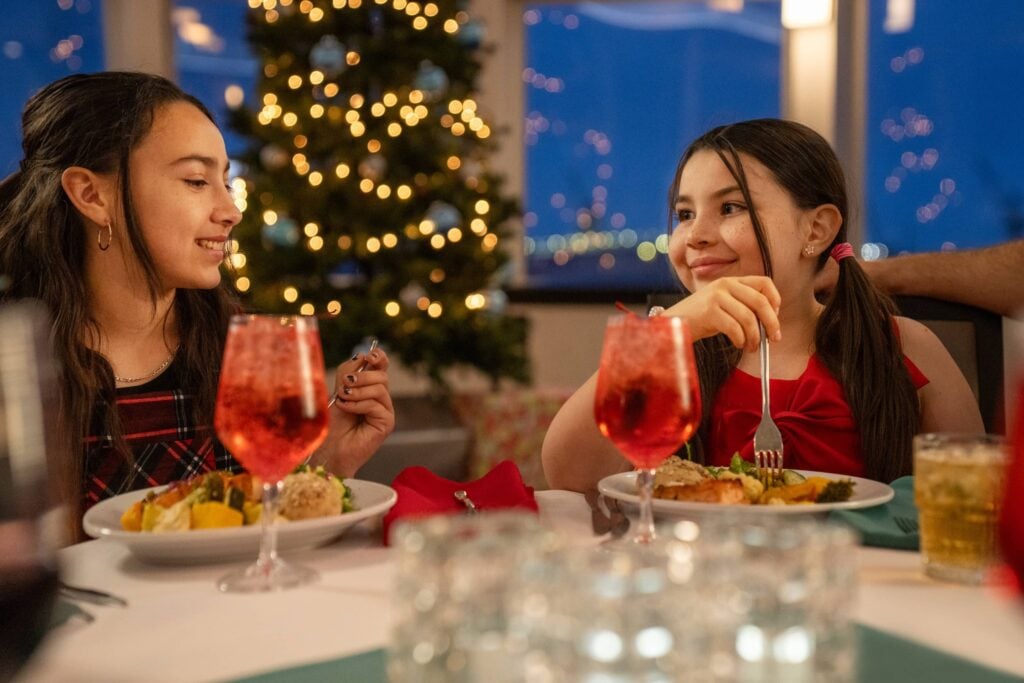 Family celebrating Christmas on City Cruises vessel