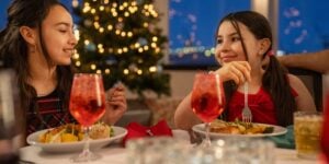 Family celebrating Christmas on City Cruises vessel