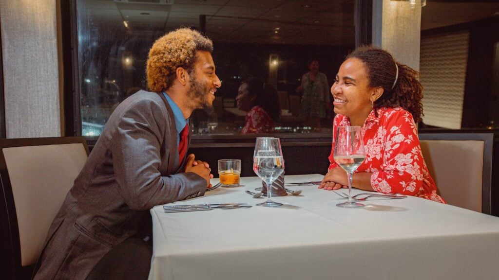 Couple enjoying dinner in Marina del Rey on a City Cruises vessel