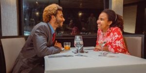 Couple enjoying dinner in Marina del Rey on a City Cruises vessel