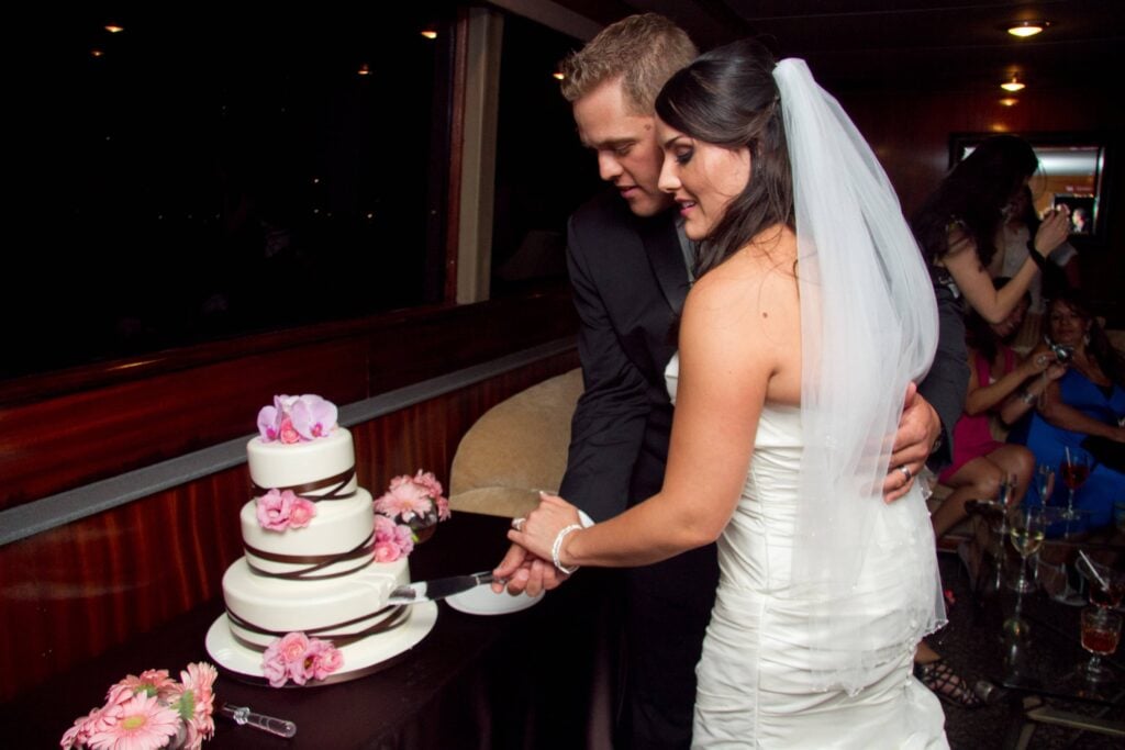 Couple celebrating their wedding in Los Angeles onboard City Cruises