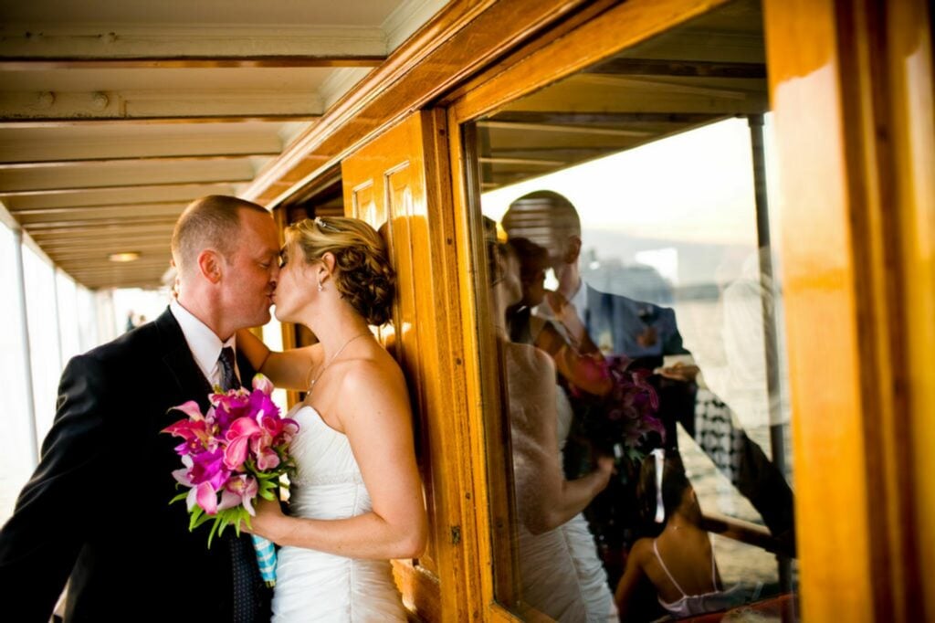 couple kissing on boat