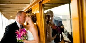 couple kissing on boat