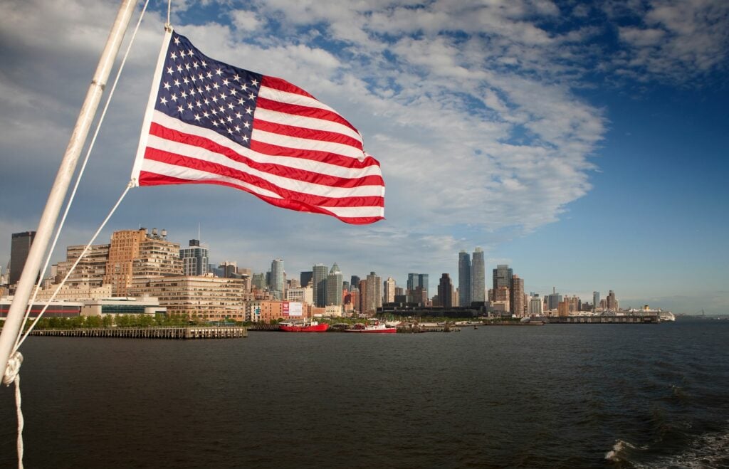 nyc flag with city skyline