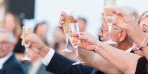 Champagne toast for a retirement party onboard City Cruises