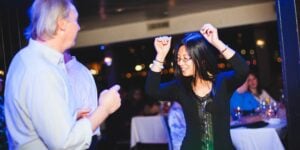 couple dancing on boat in boston